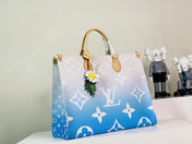 ONTHEGO GM 41 BLUE MONOGRAM GIANT COATED CANVAS