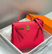 KELLY 28CM IN ROSE TYRIEN SWIFT CALFSKIN GOLD HARDWARE