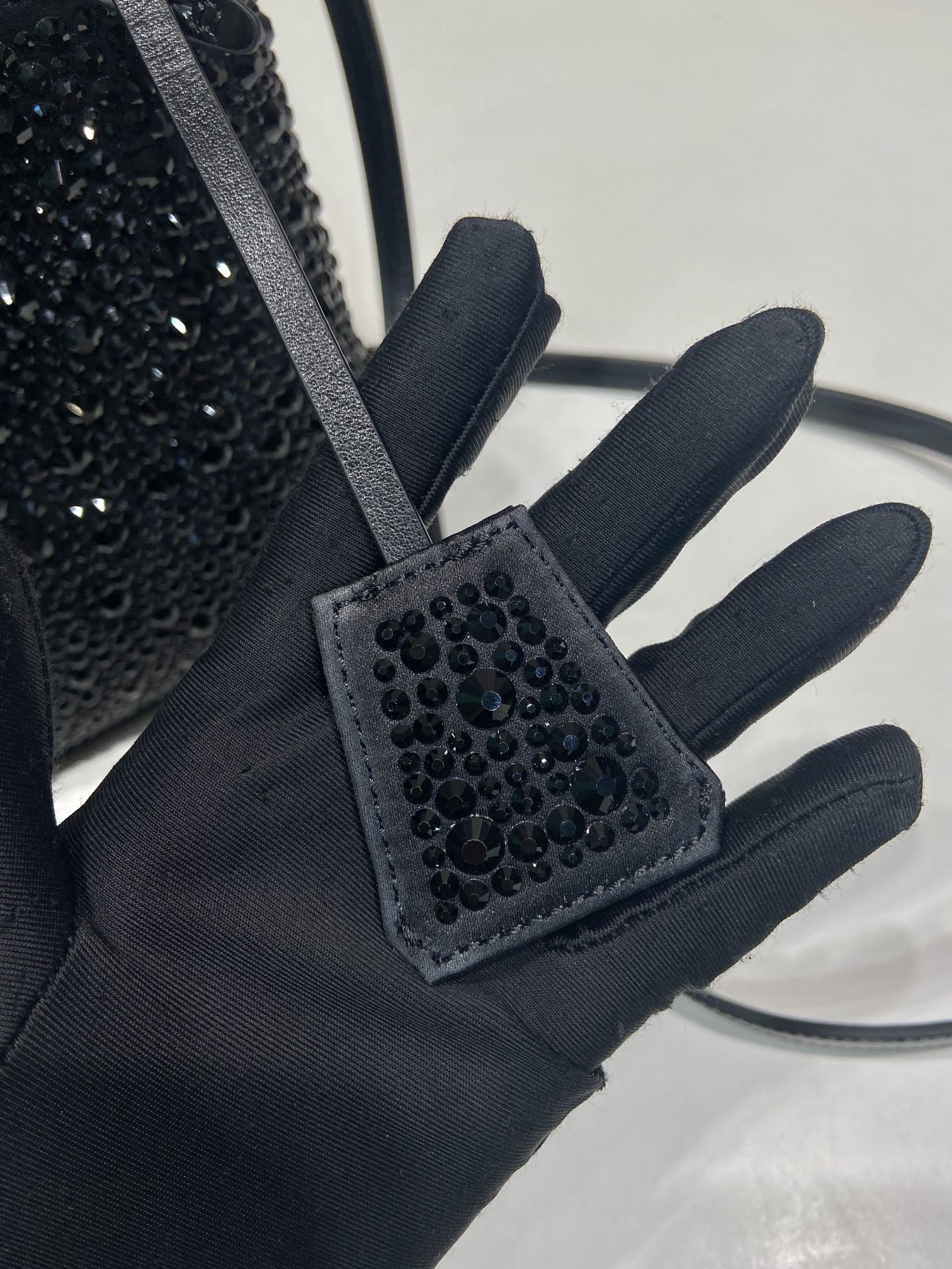 PANIER BUCKET BAG 16 IN BLACK CALFSKIN ATTACHED FULL CRYSTALS