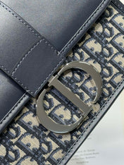 MONTAIGNE EAST-WEST BAG 24 IN BLACK LAMBSKIN AND MONOGRAM OBLIQUE JACQUARD