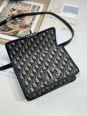 MONTAIGNE EAST-WEST BAG 24 IN BLACK LAMBSKIN AND MONOGRAM OBLIQUE JACQUARD