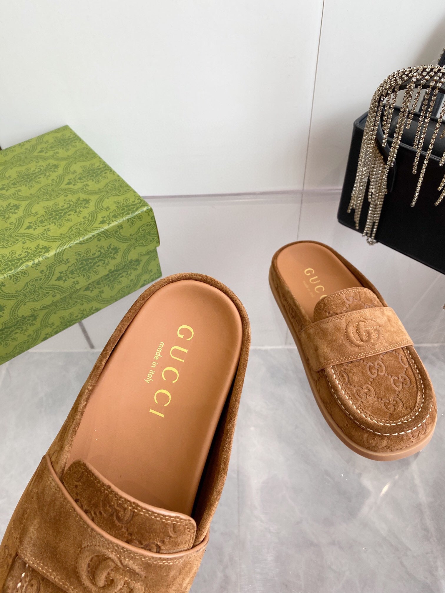 GG LOAFERS IN BROWN MONOGRAM EMBOSSED SUEDE