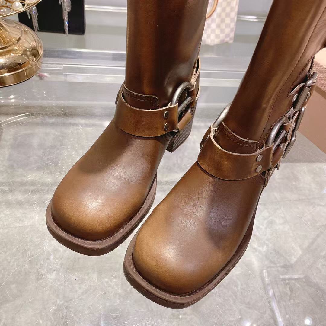 THICK-SOLED BUCKLE BOOTS IN BRORN CALFSKIN