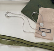 GG LOGO HEART-SHAPED PENDANT SILVER BRACELET