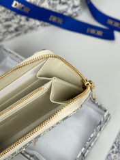 DIOR 25S LONG ZIPPER WALLET 19 IN LIGHT BLUE OBLIQUE JACQUARD CANVAS