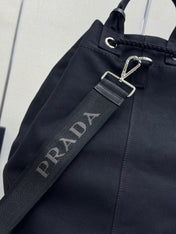 PRADA 25S DRAWSTRING BACKPACK 55 IN BLACK CANVAS LINEN SILVER HARDWARE