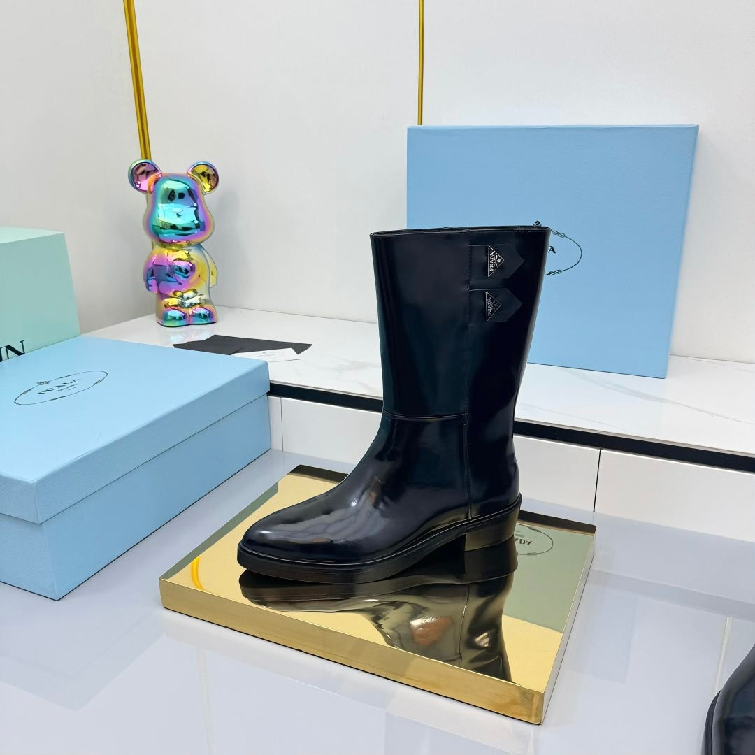 PRADA 25S BROOKLYN BOOTS 50MM IN BLACK GLOSSY CALFSKIN WITH LOGO