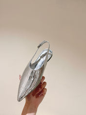 ALAIA SLINGBACK 25S IN SILVER PATENT LEATHER
