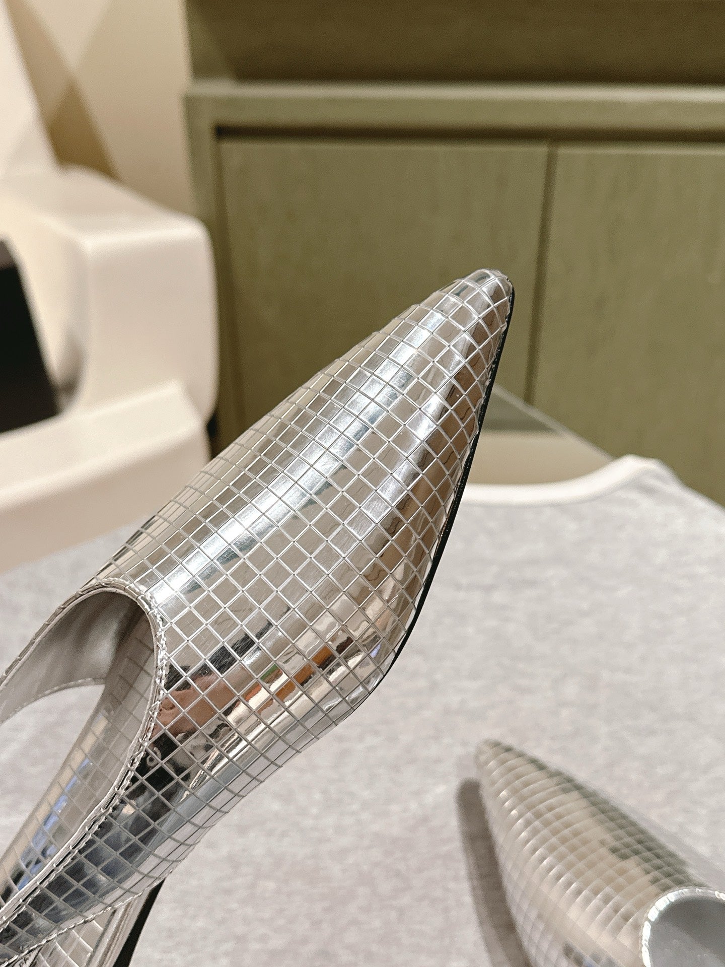 ALAIA SLINGBACK 25S IN SILVER PATENT LEATHER