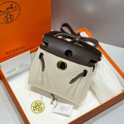 HERMES 25S MINI HERBAG 20 IN OFF WHITE AND BLACK CANVAS GOLD HARDWARE
