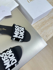 DWAY SLIDE EMBROIDERED COTTON AND BLACK MISS DIOR ALLOVER MOTIF