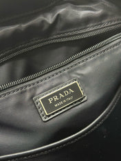 PRADA 25S BACKPACK 39 IN BLACK RE-NYLON AND SAFFIANO CALFSKIN
