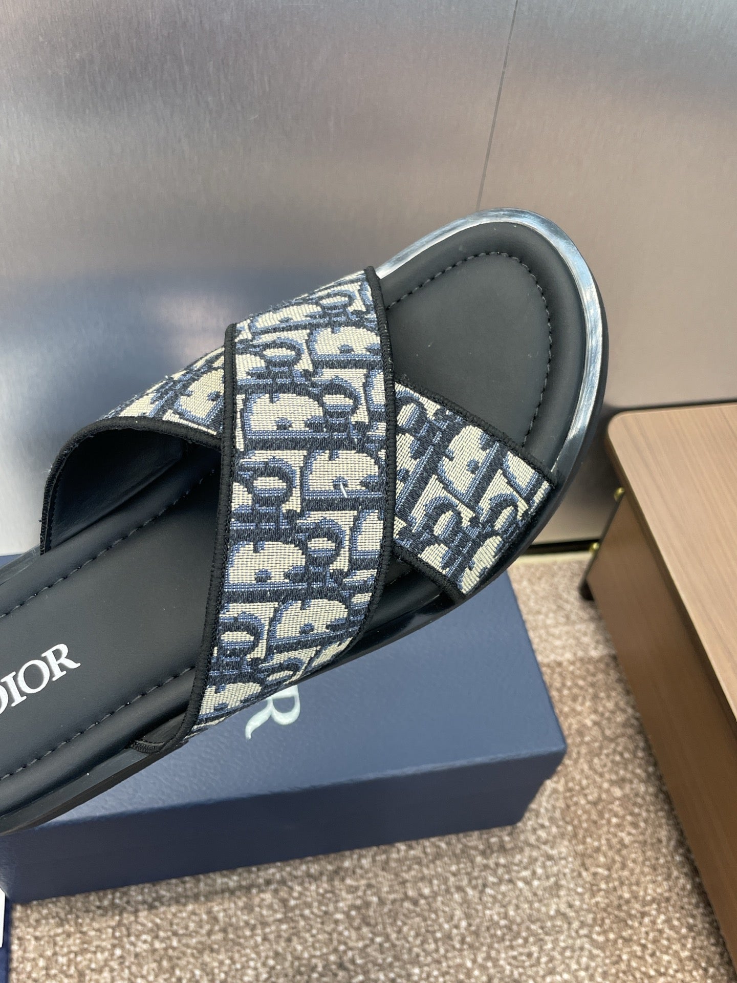 DIOR 25S ALIAS CROSS-STRAP SLIDES IN BLACK CALFSKIN WITH CD OBLIQUE DEEP BLUE LOGO