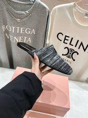 KNITTED MULES IN BLACK MIX WHITE WOOL