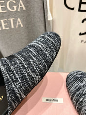 KNITTED MULES IN BLACK MIX WHITE WOOL